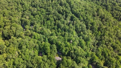 Tucked away on a quiet cul-de-sac in the desirable Holly Forest on Sapphire National Golf Club in North Carolina - for sale on GolfHomes.com, golf home, golf lot