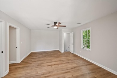 Welcome to this beautifully renovated 5-bedroom, 3.5-bathroom on Brookstone Golf and Country Club in Georgia - for sale on GolfHomes.com, golf home, golf lot