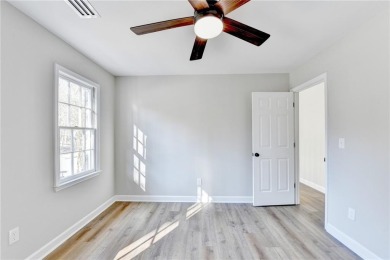 Welcome to this beautifully renovated 5-bedroom, 3.5-bathroom on Brookstone Golf and Country Club in Georgia - for sale on GolfHomes.com, golf home, golf lot