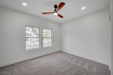 Welcome to this impeccably upgraded home, ideally located just on Highland Falls Golf Club in Nevada - for sale on GolfHomes.com, golf home, golf lot