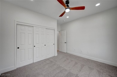 Welcome to this impeccably upgraded home, ideally located just on Highland Falls Golf Club in Nevada - for sale on GolfHomes.com, golf home, golf lot