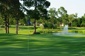 Build-able lot on a quiet street near the East Course in on Hide-A-Way Lake Golf Course in Texas - for sale on GolfHomes.com, golf home, golf lot