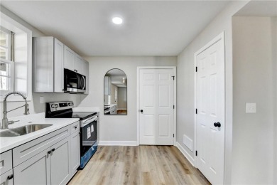 Welcome to this beautifully renovated 5-bedroom, 3.5-bathroom on Brookstone Golf and Country Club in Georgia - for sale on GolfHomes.com, golf home, golf lot