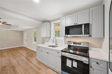 Welcome to this beautifully renovated 5-bedroom, 3.5-bathroom on Brookstone Golf and Country Club in Georgia - for sale on GolfHomes.com, golf home, golf lot