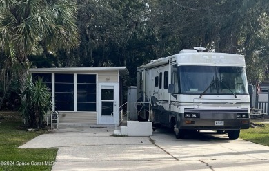 This Florida room located in The Great Outdoors Premier RV/Golf on The Great Outdoors Golf and Country Club in Florida - for sale on GolfHomes.com, golf home, golf lot