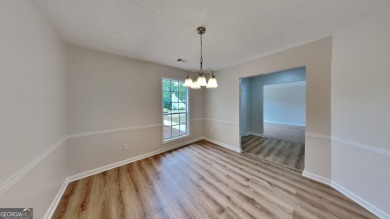 This renovated 3 bedroom, 2 bathroom home offers modern living on Mystery Valley Golf Course in Georgia - for sale on GolfHomes.com, golf home, golf lot