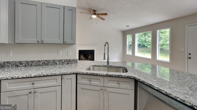 This renovated 3 bedroom, 2 bathroom home offers modern living on Mystery Valley Golf Course in Georgia - for sale on GolfHomes.com, golf home, golf lot