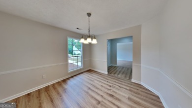 This renovated 3 bedroom, 2 bathroom home offers modern living on Mystery Valley Golf Course in Georgia - for sale on GolfHomes.com, golf home, golf lot