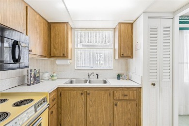 Live the Florida Coastal Lifestyle! This Ironwood Condominium on Pinebrook/Ironwood Golf Course in Florida - for sale on GolfHomes.com, golf home, golf lot