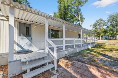 Your Dream Beach Escape Awaits at Sunset Beach! Yes-dreams on Oyster Bay Golf Links in North Carolina - for sale on GolfHomes.com, golf home, golf lot