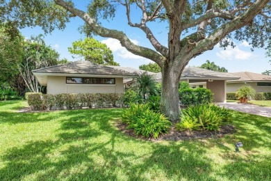 Welcome to your tranquil retreat featuring a captivating garden on Quail Ridge Golf Course and Country Club in Florida - for sale on GolfHomes.com, golf home, golf lot