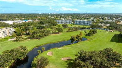 Live the Florida Coastal Lifestyle! This Ironwood Condominium on Pinebrook/Ironwood Golf Course in Florida - for sale on GolfHomes.com, golf home, golf lot