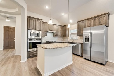 Beautifully maintained single-story home offering 3 bedrooms, 2 on The Golf Club At Champions Circle in Texas - for sale on GolfHomes.com, golf home, golf lot