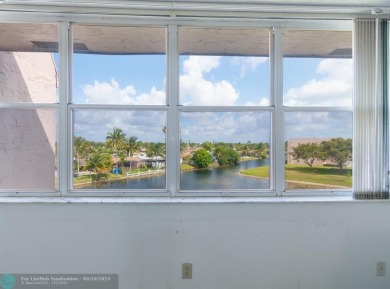 MOST ATTRACTIVE PRICE for One of the LARGEST CONDOS in Sunrise on Sunrise Lakes Phase IV Golf Course in Florida - for sale on GolfHomes.com, golf home, golf lot