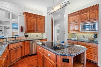 Experience elegant living in this custom-built home nestled in on Walnut Creek Country Club in Texas - for sale on GolfHomes.com, golf home, golf lot