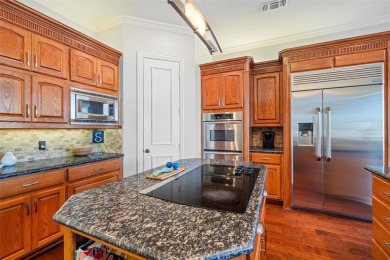Experience elegant living in this custom-built home nestled in on Walnut Creek Country Club in Texas - for sale on GolfHomes.com, golf home, golf lot