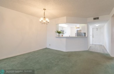 MOST ATTRACTIVE PRICE for One of the LARGEST CONDOS in Sunrise on Sunrise Lakes Phase IV Golf Course in Florida - for sale on GolfHomes.com, golf home, golf lot