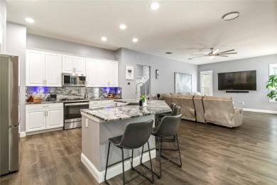 Stunning Smart Pool Home with Major Upgrades in a Gated Golf on Lexington Oaks Golf Club in Florida - for sale on GolfHomes.com, golf home, golf lot
