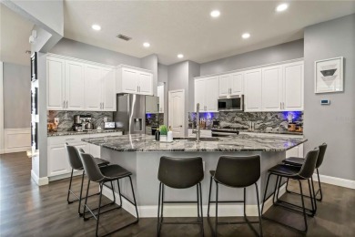 Stunning Smart Pool Home with Major Upgrades in a Gated Golf on Lexington Oaks Golf Club in Florida - for sale on GolfHomes.com, golf home, golf lot