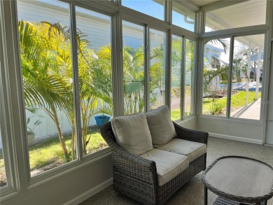Enjoy the perfect blend of style & comfort in this partially on Mangrove Bay Golf Course in Florida - for sale on GolfHomes.com, golf home, golf lot
