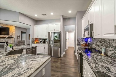Stunning Smart Pool Home with Major Upgrades in a Gated Golf on Lexington Oaks Golf Club in Florida - for sale on GolfHomes.com, golf home, golf lot