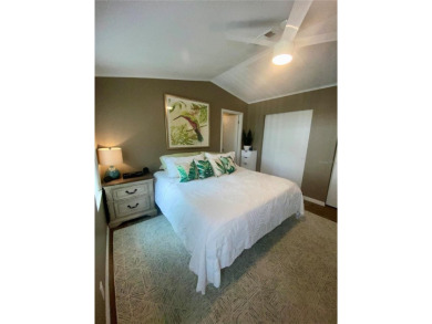 Enjoy the perfect blend of style & comfort in this partially on Mangrove Bay Golf Course in Florida - for sale on GolfHomes.com, golf home, golf lot