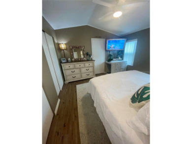 Enjoy the perfect blend of style & comfort in this partially on Mangrove Bay Golf Course in Florida - for sale on GolfHomes.com, golf home, golf lot