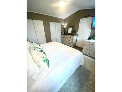 Enjoy the perfect blend of style & comfort in this partially on Mangrove Bay Golf Course in Florida - for sale on GolfHomes.com, golf home, golf lot