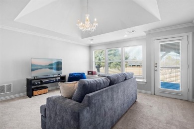 Experience elegant living in this custom-built home nestled in on Walnut Creek Country Club in Texas - for sale on GolfHomes.com, golf home, golf lot