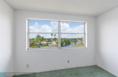 MOST ATTRACTIVE PRICE for One of the LARGEST CONDOS in Sunrise on Sunrise Lakes Phase IV Golf Course in Florida - for sale on GolfHomes.com, golf home, golf lot
