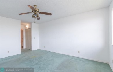 MOST ATTRACTIVE PRICE for One of the LARGEST CONDOS in Sunrise on Sunrise Lakes Phase IV Golf Course in Florida - for sale on GolfHomes.com, golf home, golf lot