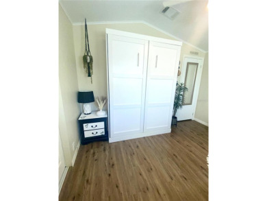 Enjoy the perfect blend of style & comfort in this partially on Mangrove Bay Golf Course in Florida - for sale on GolfHomes.com, golf home, golf lot