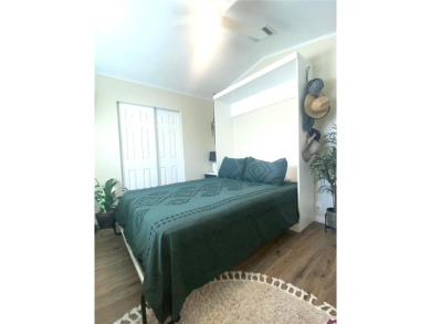 Enjoy the perfect blend of style & comfort in this partially on Mangrove Bay Golf Course in Florida - for sale on GolfHomes.com, golf home, golf lot