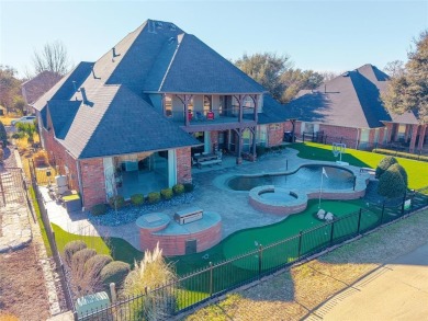 Experience elegant living in this custom-built home nestled in on Walnut Creek Country Club in Texas - for sale on GolfHomes.com, golf home, golf lot