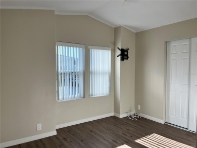 Enjoy the perfect blend of style & comfort in this partially on Mangrove Bay Golf Course in Florida - for sale on GolfHomes.com, golf home, golf lot