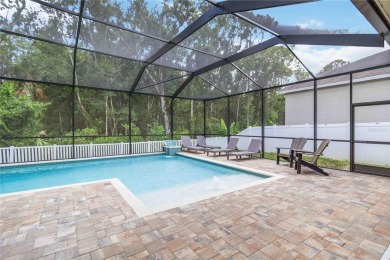 Stunning Smart Pool Home with Major Upgrades in a Gated Golf on Lexington Oaks Golf Club in Florida - for sale on GolfHomes.com, golf home, golf lot