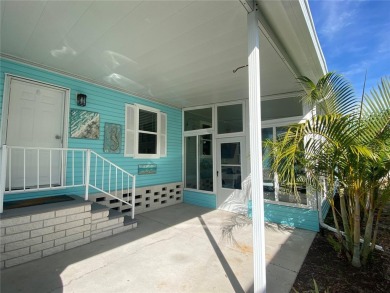 Enjoy the perfect blend of style & comfort in this partially on Mangrove Bay Golf Course in Florida - for sale on GolfHomes.com, golf home, golf lot