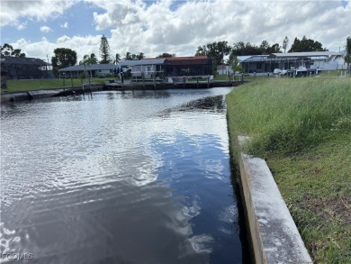 Direct Sailboat Access Waterfront Lot w/ Prime Location in Cape on El Rio Golf Course and Club in Florida - for sale on GolfHomes.com, golf home, golf lot