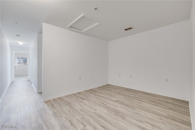 Set against a peaceful preserve backdrop, this well-maintained on Gateway Golf and Country Club in Florida - for sale on GolfHomes.com, golf home, golf lot