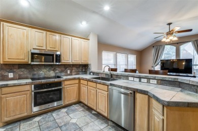 This 1 story home offers a harmonious blend of cozy and comfort on Stewart Peninsula Golf Course in Texas - for sale on GolfHomes.com, golf home, golf lot