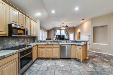 This 1 story home offers a harmonious blend of cozy and comfort on Stewart Peninsula Golf Course in Texas - for sale on GolfHomes.com, golf home, golf lot