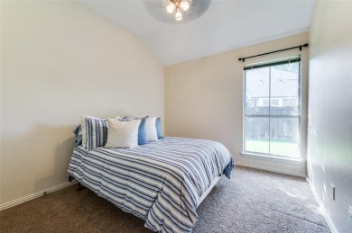 This 1 story home offers a harmonious blend of cozy and comfort on Stewart Peninsula Golf Course in Texas - for sale on GolfHomes.com, golf home, golf lot