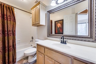 This 1 story home offers a harmonious blend of cozy and comfort on Stewart Peninsula Golf Course in Texas - for sale on GolfHomes.com, golf home, golf lot