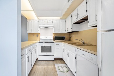 Great golf community with no membership fees.  2 bedroom with a on Atlantis Golf Club in Florida - for sale on GolfHomes.com, golf home, golf lot