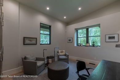 Nestled against the Bridger-Teton National Forest, 15415 Tall on Snake River Sporting Club in Wyoming - for sale on GolfHomes.com, golf home, golf lot