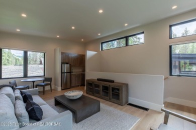Nestled against the Bridger-Teton National Forest, 15415 Tall on Snake River Sporting Club in Wyoming - for sale on GolfHomes.com, golf home, golf lot