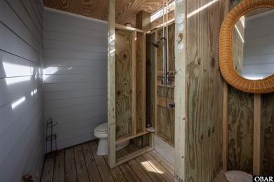 This well maintained, custom built, 3BR / 2.5BA residence on The Currituck Golf Club in North Carolina - for sale on GolfHomes.com, golf home, golf lot