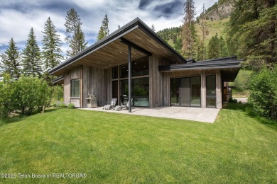 Nestled against the Bridger-Teton National Forest, 15415 Tall on Snake River Sporting Club in Wyoming - for sale on GolfHomes.com, golf home, golf lot