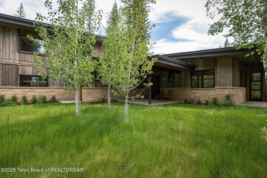 Nestled against the Bridger-Teton National Forest, 15415 Tall on Snake River Sporting Club in Wyoming - for sale on GolfHomes.com, golf home, golf lot