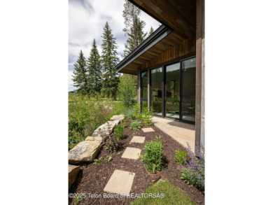 Nestled against the Bridger-Teton National Forest, 15415 Tall on Snake River Sporting Club in Wyoming - for sale on GolfHomes.com, golf home, golf lot